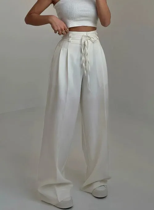 Lina - Elegant wide-leg trousers with high waist and belt detail