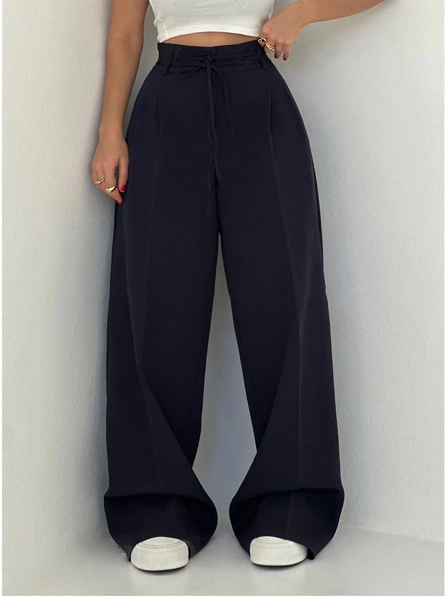 Lina - Elegant wide-leg trousers with high waist and belt detail